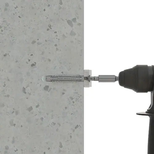 Paso 5 fijación en hormigón con atornillador del taco de Nylon® TN4S-L del soporte y del anclaje